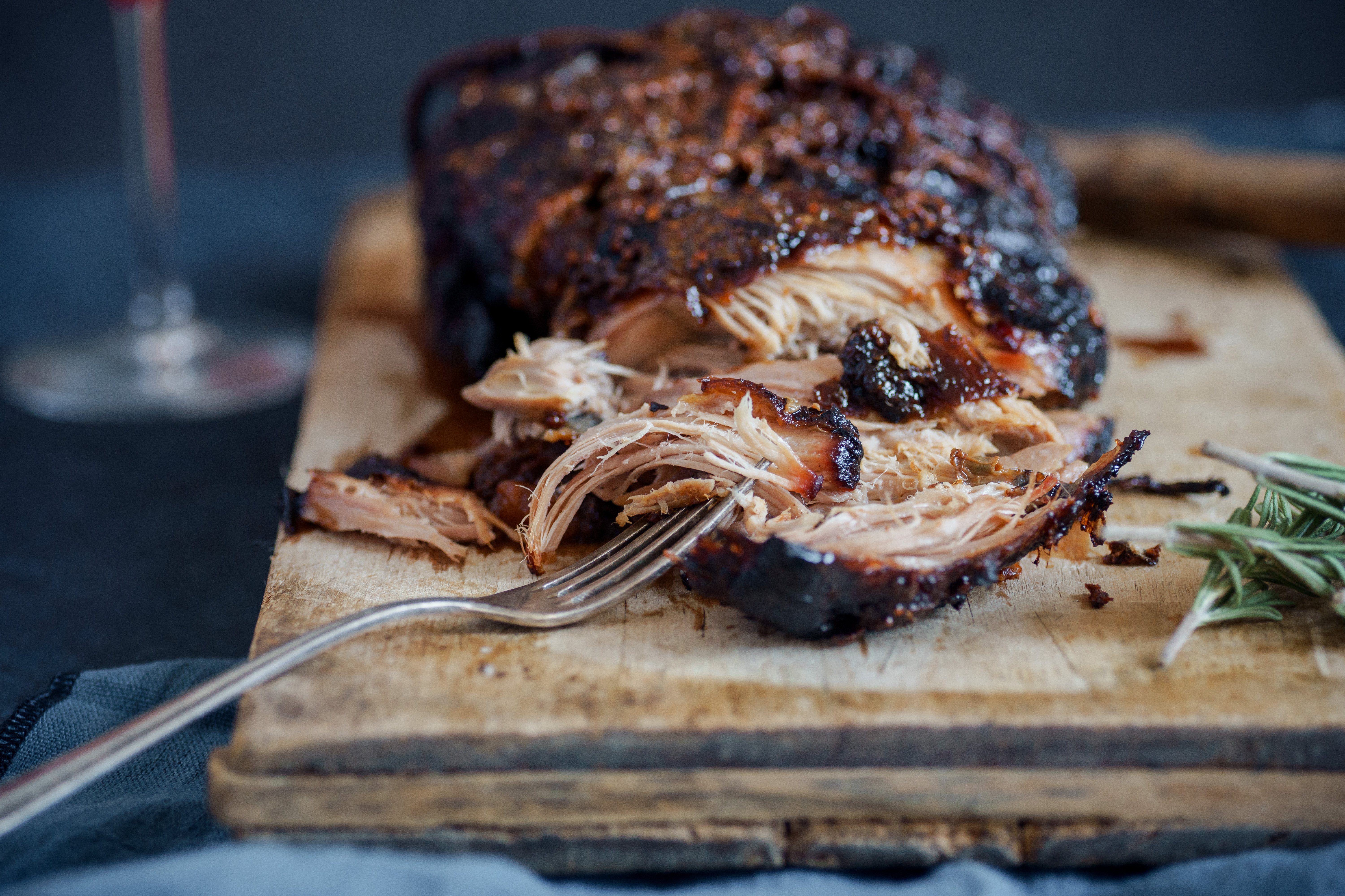 Pulled smoked pork on a wooden board